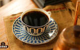 A cup of Mantelin, half of coffee history