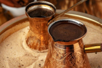 The divination pattern of Turkish coffee explains how Turkish coffee is made and why it doesn't filter dregs.