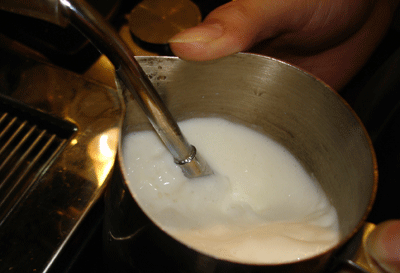 Answer why the milk for making coffee needs to be refrigerated and how to make good foam.