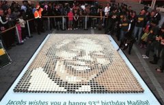People celebrate Mandela's birthday with coffee cups.