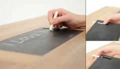 A blackboard coffee table for guests to interact with