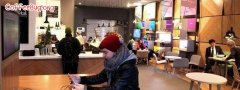 Microsoft opens a digital coffee shop where customers can play with tablets and mobile phones.