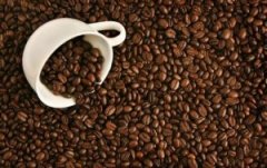 Graded coffee raw bean treatment