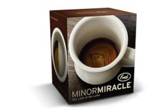 The remnant juice at the bottom of the miracle coffee cup outlines the miracle picture