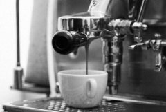 The process of making a cup of coffee by an Italian coffee machine.