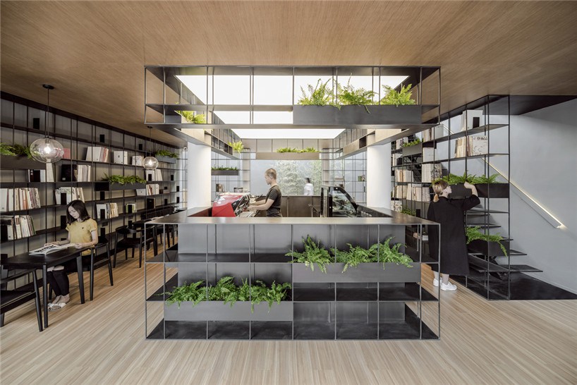 A compound bookstore, Baozhai Coffee House, which integrates coffee shop and plant room.