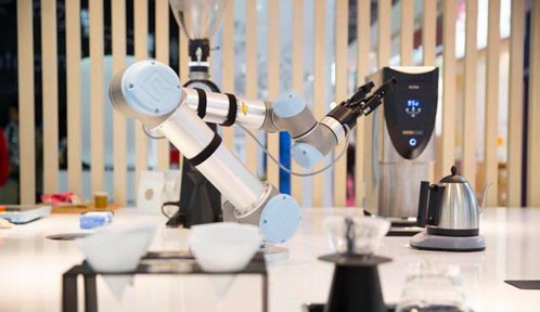 The intelligent coffee shop is well equipped and the robot waiter will take your order.
