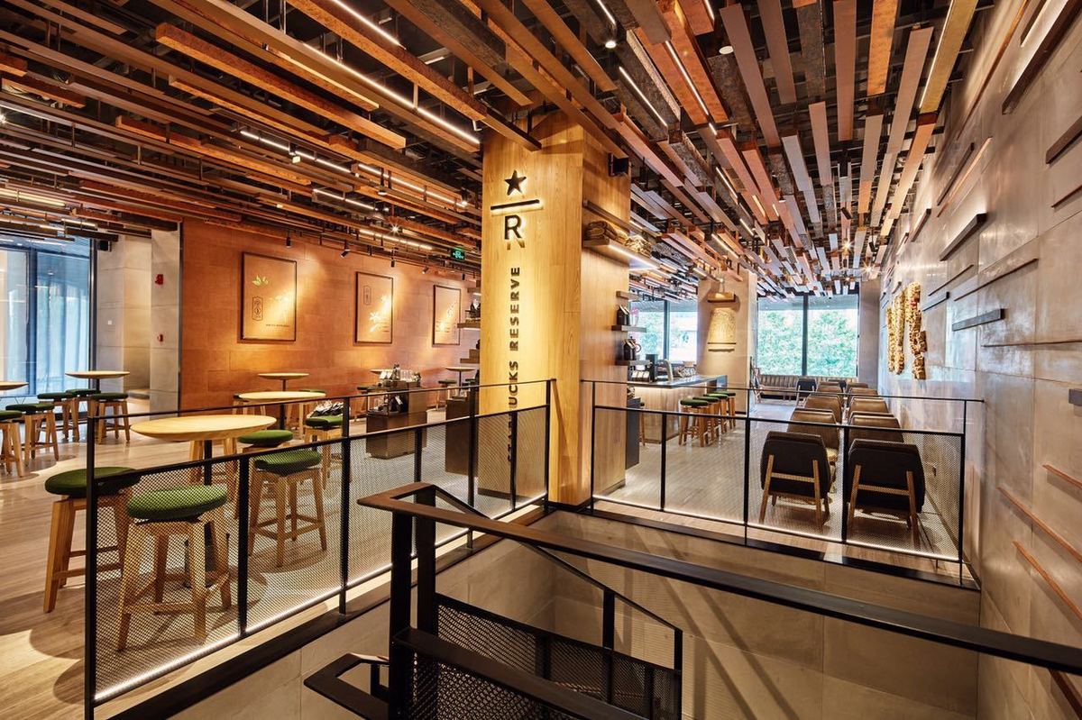 Starbucks' opening of more selected stores is not as simple as letting people take pictures.