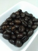 Why is there oil on the surface of roasted coffee beans? 