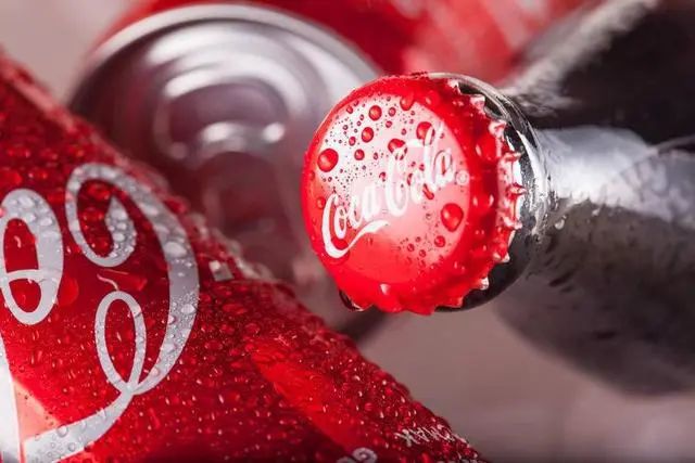 What are the beverage brands of Coca-Cola the competition between Coca-Cola and Pepsi